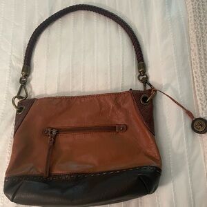 The Sak Two-Tone Brown and Dark Brown Braided-Handle Shoulder Bag.